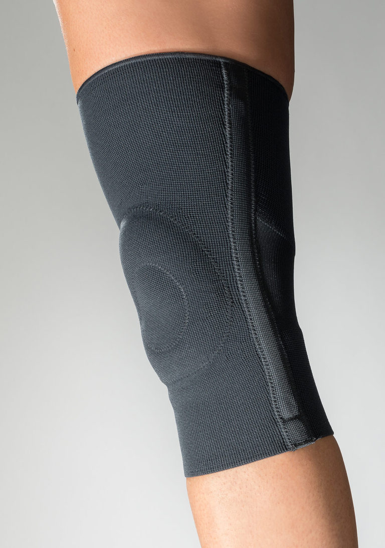 Knee support bandage with lateral reinforcements Hamaorthes